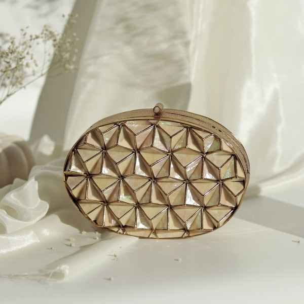 Maya 3D Mother of Pearl clutch bag by The Tan Clan with intricate pearl detailing and sleek design.