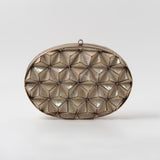 Maya 3D Mother of Pearl Clutch by The Tan Clan showing iridescent pearl finish and sleek, elegant design.
