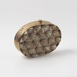 Maya 3D Mother of Pearl Clutch by The Tan Clan featuring iridescent pearl design and sleek rectangular shape.