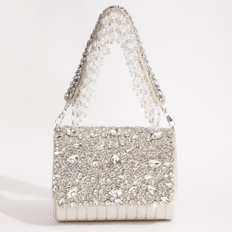 Mehfil combo with Noor Mother of Pearl clutch and Grace white flap bag, featuring elegant designs and premium craftsmanship by THE TAN CLAN