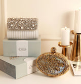 Mehfil combo featuring a Noor Mother of Pearl clutch and a Grace white flap bag, both with elegant designs and polished finishes.