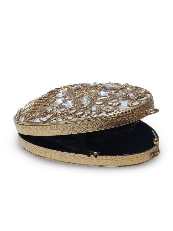 Mia Intricate Brass Clutch by The Tan Clan featuring detailed brass craftsmanship and a sleek, elegant design.