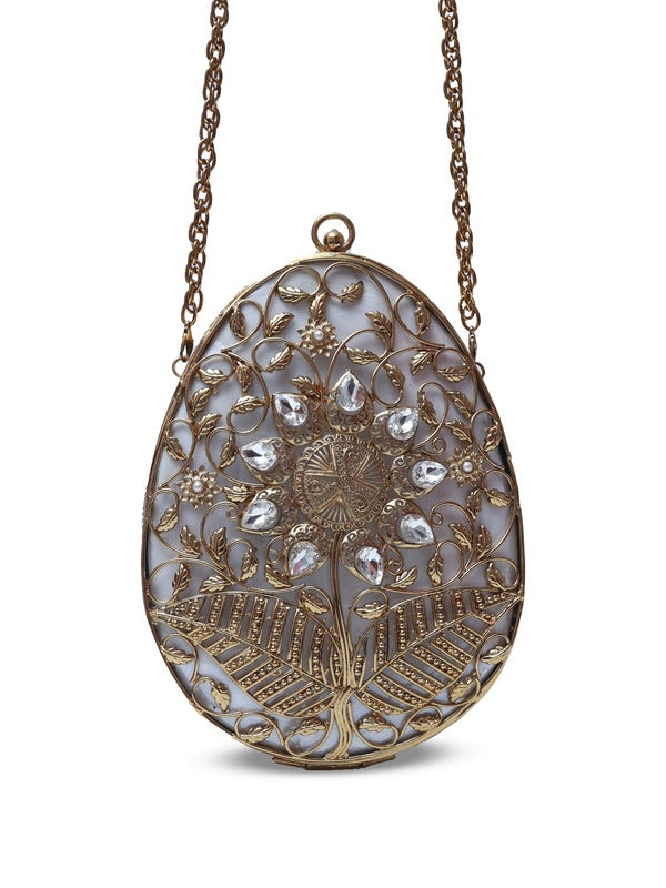 Mia Intricate Brass Clutch by The Tan Clan featuring detailed brass craftsmanship and elegant design.