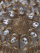 Mia intricate brass clutch by The Tan Clan featuring detailed craftsmanship and a sleek, elegant design.