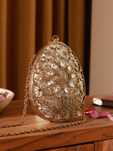 Elegant Mia Intricate Brass Clutch with detailed craftsmanship, featuring a sleek design and metallic finish by The Tan Clan