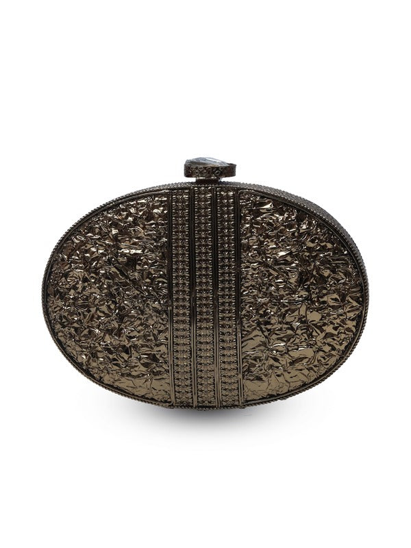 Intricate brass clutch bag from The Tan Clan with detailed embellishments and elegant design, perfect for special occasions.
