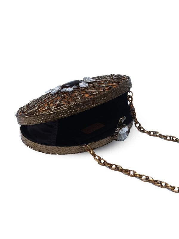 Mirza embroidered brass clutch by The Tan Clan with intricate embellishments and traditional design.