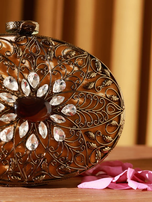 Mirza brass clutch by The Tan Clan featuring intricate embellishments and detailed craftsmanship, stylish and elegant for special occasions.