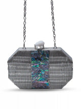 Silver Mother of Pearl clutch bag by The Tan Clan featuring a sleek, elegant design with shimmering surface and compact size.