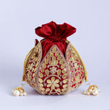 Handcrafted Mrig Gota Patti mini lotus potli bag by The Tan Clan, featuring intricate embroidery and traditional design.