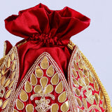 Mini lotus-shaped potli bag by The Tan Clan featuring intricate Mrig Gota Patti handwork and traditional design.