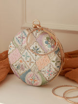 Mughal round clutch bag by The Tan Clan featuring intricate traditional patterns and a round shape.