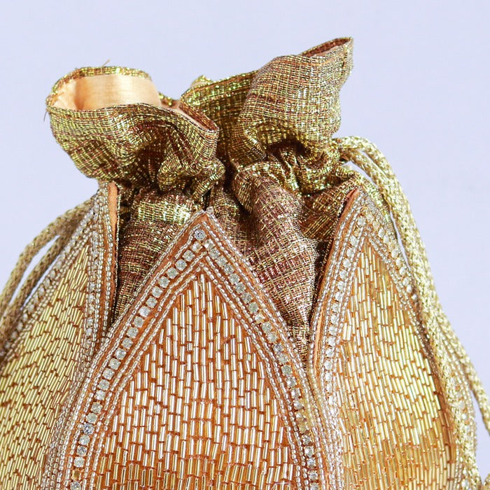 Hand-embroidered Mulya Mini Lotus Potli bag by The Tan Clan, showcasing intricate floral embroidery and traditional design.