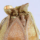 Hand-embroidered Mulya Mini Lotus Potli bag by The Tan Clan, showcasing intricate floral embroidery and traditional design.