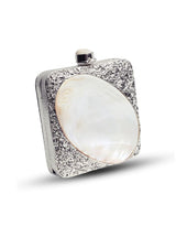 Elegant Mumtaz Mother of Pearl Clutch by The Tan Clan featuring a shimmering pearl exterior and sleek compact design.