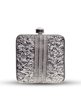 Elegant Mumtaz Mother of Pearl Clutch by The Tan Clan featuring a shimmering pearl design and sleek rectangular shape.