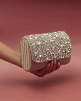 Grace beige flap bag and silver clutch from THE TAN CLAN Glitz Grace Combo, stylish accessories for modern brides.