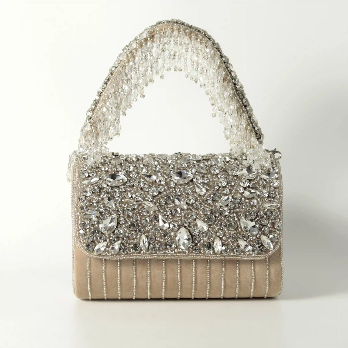 Grace beige flap bag and silver clutch from THE TAN CLAN's Glitz Grace Combo, stylish accessories for modern brides.