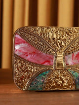 Naina Mother of Pearl Clutch by The Tan Clan featuring iridescent mother of pearl surface and elegant compact design.