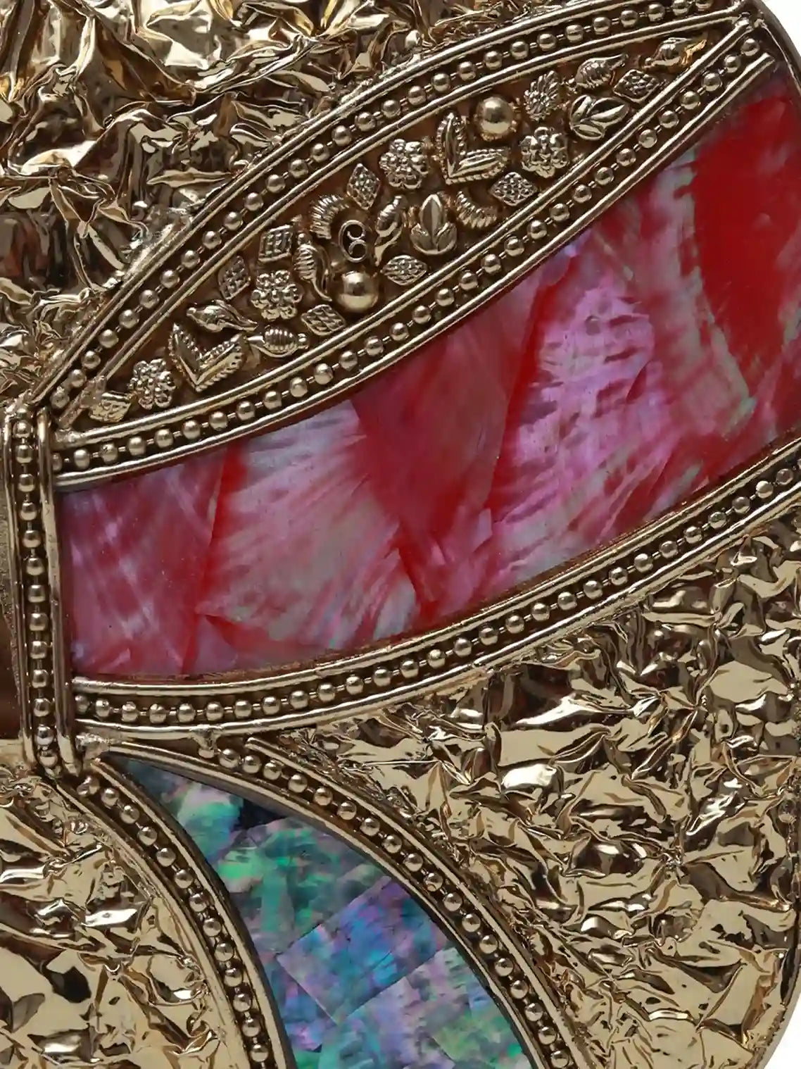 Naina Mother of Pearl Clutch by The Tan Clan featuring iridescent pearl design and elegant rectangular shape.