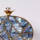 Embellished Nargis Mother of Pearl Clutch by The Tan Clan showing intricate pearl and bead detailing on a elegant evening bag
