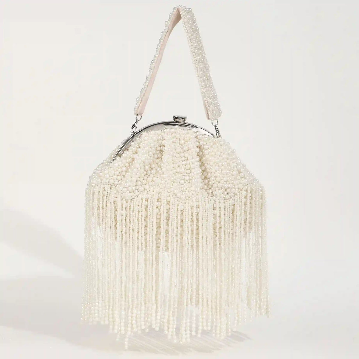 Afrah Pearl Combo featuring a black embroidered clutch and pearl Batua bag, stylish accessories by THE TAN CLAN for modern brides.