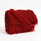 Rosa beaded flap-over clutch bag by The Tan Clan featuring elegant beading and a compact design perfect for special occasions