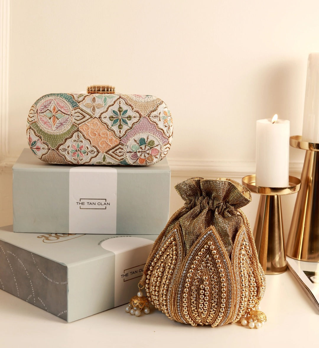Navratri special edition combo from THE TAN CLAN featuring a Mughal long clutch and Swarn mini lotus potli.