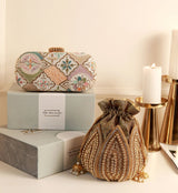 Navratri special edition combo from THE TAN CLAN featuring a Mughal long clutch and Swarn mini lotus potli.