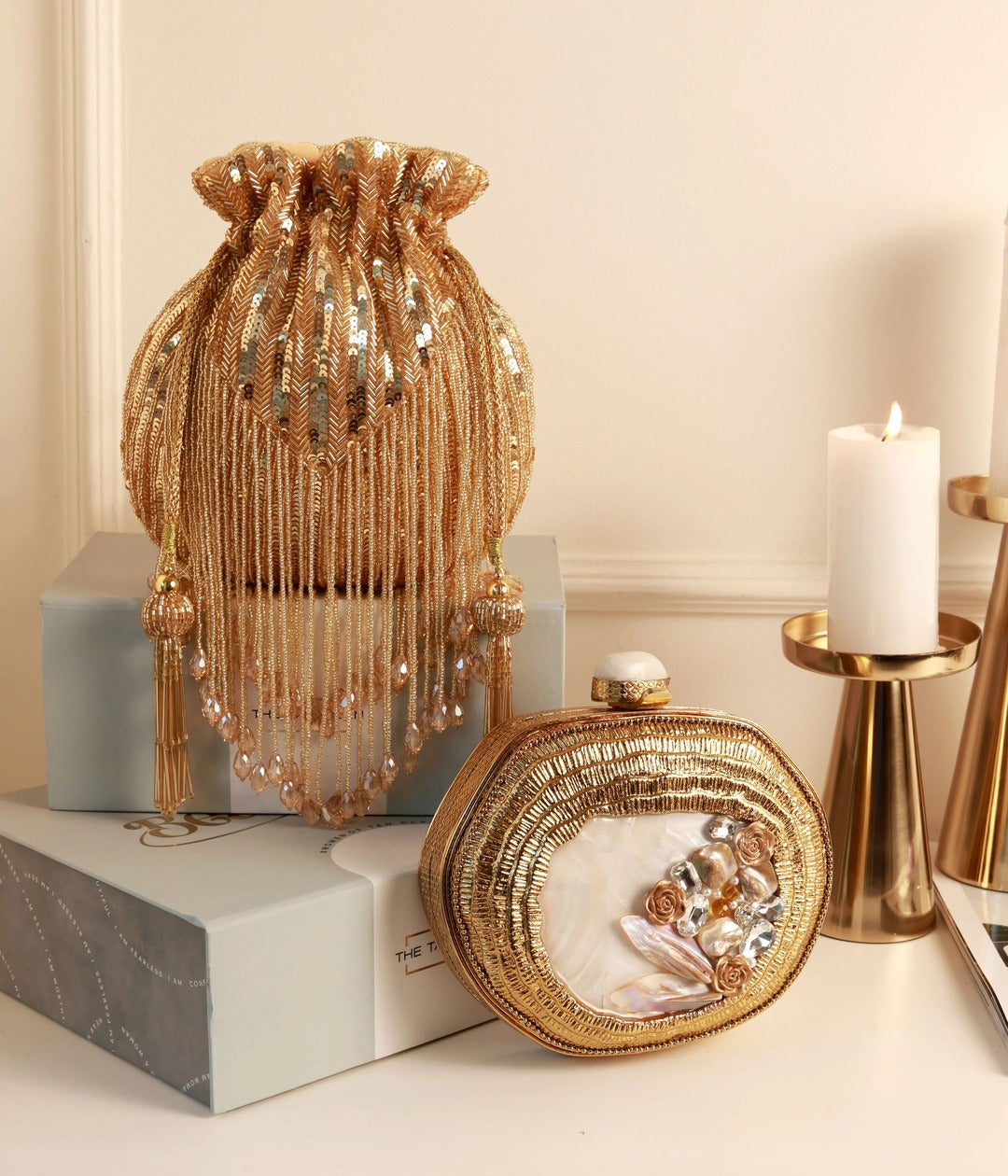 Nazakat Combo: Sana Mother of Pearl clutch and Twinkle gold potli bag with intricate embellishments, stylish accessories for special occasions.