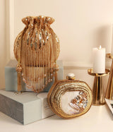 Nazakat Combo: Sana Mother of Pearl clutch and Twinkle gold potli bag with intricate embellishments, stylish accessories for special occasions.