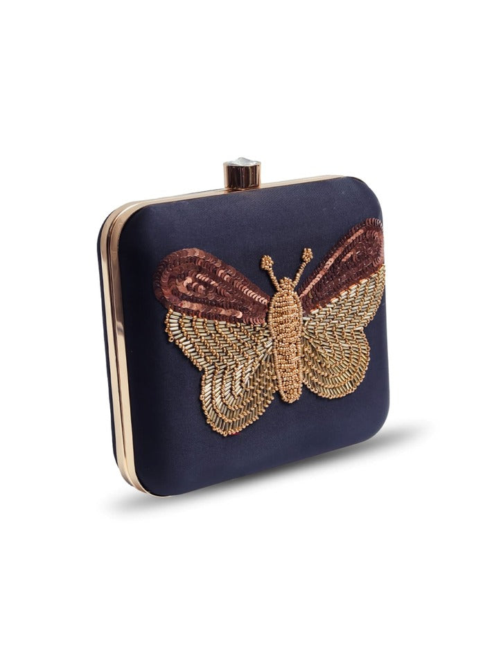 Black square butterfly clutch purse with hand embroidery by Nigah from The Tan Clan, featuring intricate butterfly design.