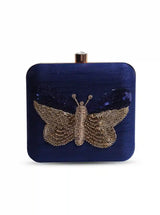 Square Nigah clutch by The Tan Clan featuring hand embroidery with colorful butterfly design and elegant craftsmanship.