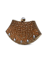 Intricate embellished brass clutch by The Tan Clan featuring detailed craftsmanship and elegant design.