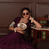 Noor golden brass clutch with mother of pearl inlay from The Tan Clan, featuring a sleek, elegant design and metallic finish.