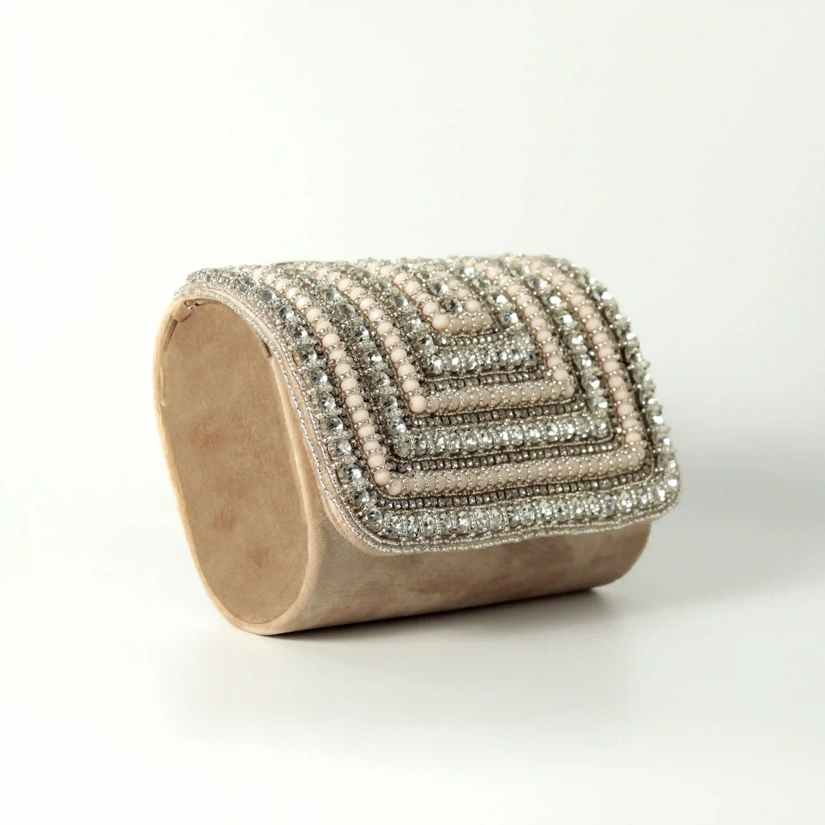 Nysa embellished flap-over clutch bag by The Tan Clan featuring intricate beadwork and a sleek design for elegant occasions.