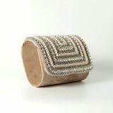 Nysa embellished flap-over clutch bag by The Tan Clan featuring intricate beadwork and a sleek design for elegant occasions.