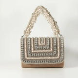 Nysa Embellished Flap Over Clutch Bag by The Tan Clan featuring decorative embellishments and a sleek flap closure.