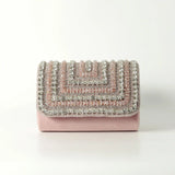 Nysa Embellished Flap Over Clutch Bag by The Tan Clan, featuring decorative embellishments and a sleek flap closure.