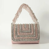 Nysa embellished flap-over clutch bag by The Tan Clan with decorative details and sleek design, suitable for evening or formal occasions.