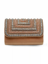 Nysa Gold Embellished Flap Over Clutch Bag by The Tan Clan with gold accents and elegant design on a black background.