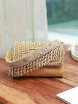Gold embellished flap-over clutch bag by The Tan Clan, featuring elegant design and compact size for evening occasions.