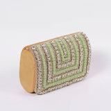 Green Nysa clutch bag by The Tan Clan with embellished flap and elegant design, perfect for evening or special occasions.