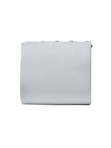 Nysa white mini bag by The Tan Clan with embroidered handle, showcasing a stylish compact bag with detailed embroidery.