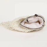 Pearl Batua bag with tassels from The Tan Clan, featuring a traditional design and intricate pearl detailing.