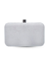 Pearly silver hand-embroidered clutch bag by The Tan Clan with intricate embroidery and a sleek, elegant design.