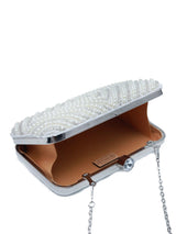 Pearly white hand-embroidered clutch bag by The Tan Clan featuring intricate embroidery and a sleek, elegant design.