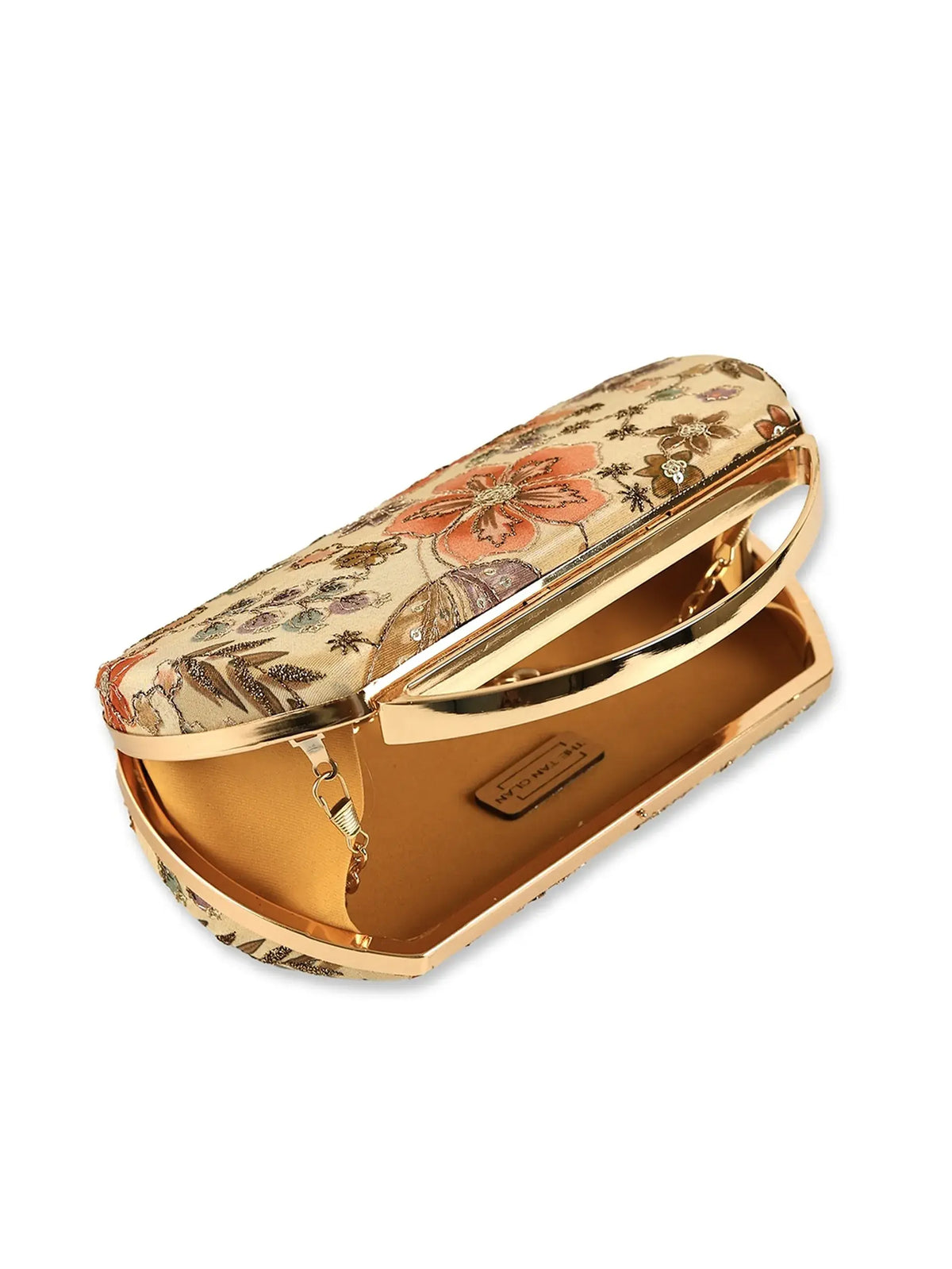 Petal beige capsule clutch by The Tan Clan featuring a sleek, compact design with a textured exterior and minimalist style.