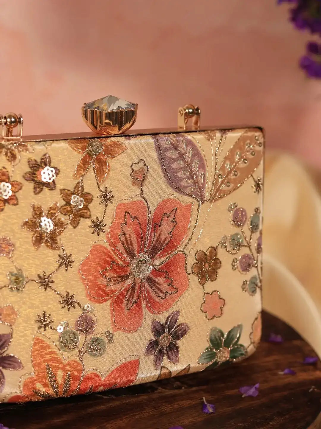 Petal beige casket clutch bag by The Tan Clan featuring a sleek, elegant design with floral petal details for formal occasions.