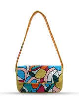 Multicolor Poppy baguette bag with handle by The Tan Clan, featuring a vibrant, compact design and stylish shoulder strap.